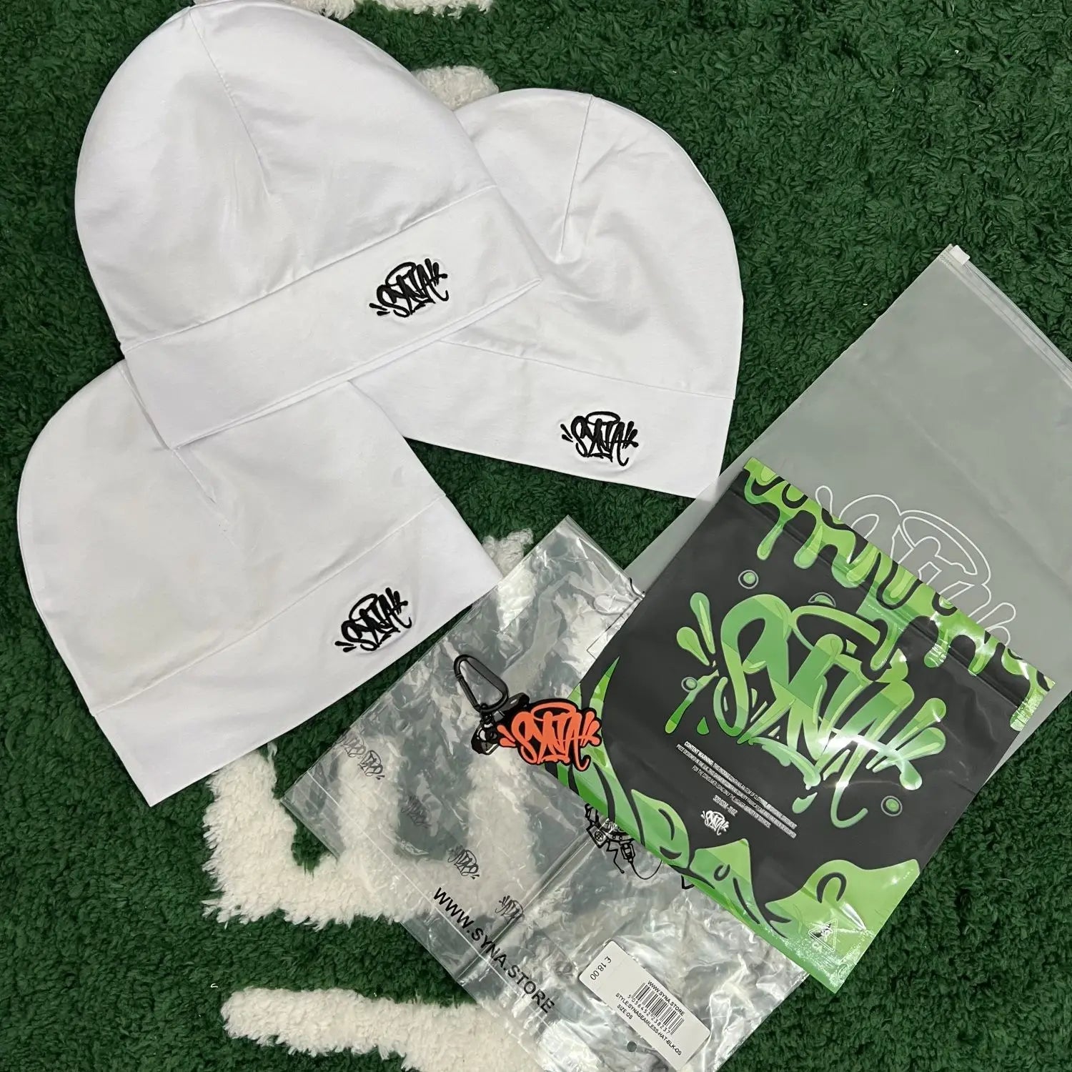 Synaworldbeanies one-size fits all.