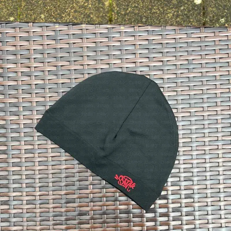 Synaworldbeanies one-size fits all.