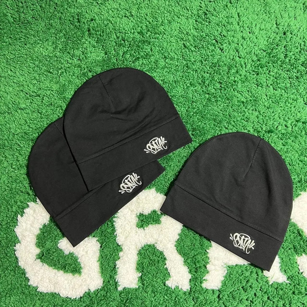 Synaworldbeanies one-size fits all.