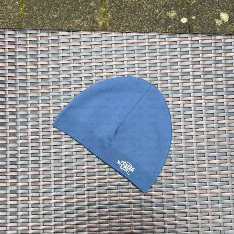 Synaworldbeanies one-size fits all.