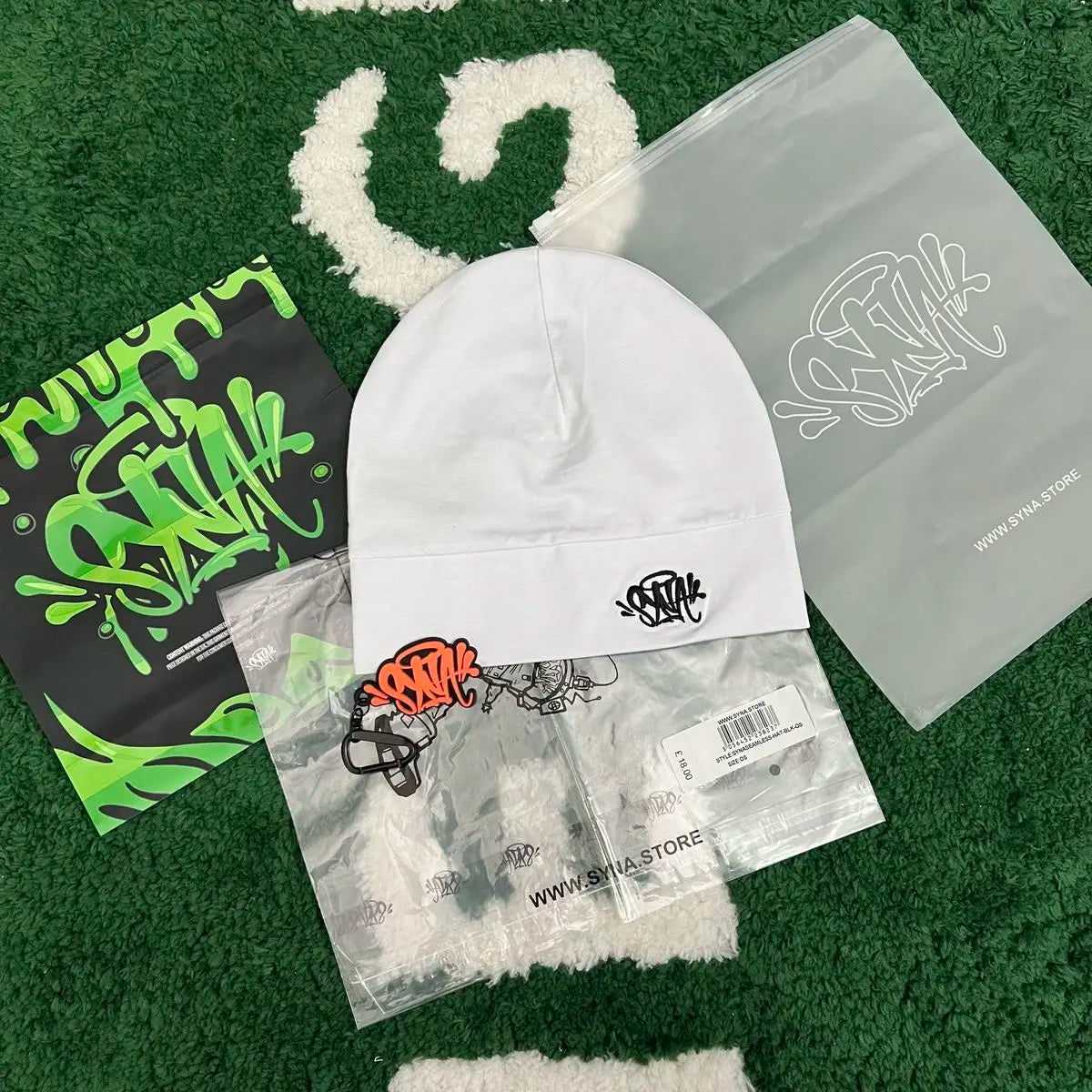 Synaworldbeanies one-size fits all.