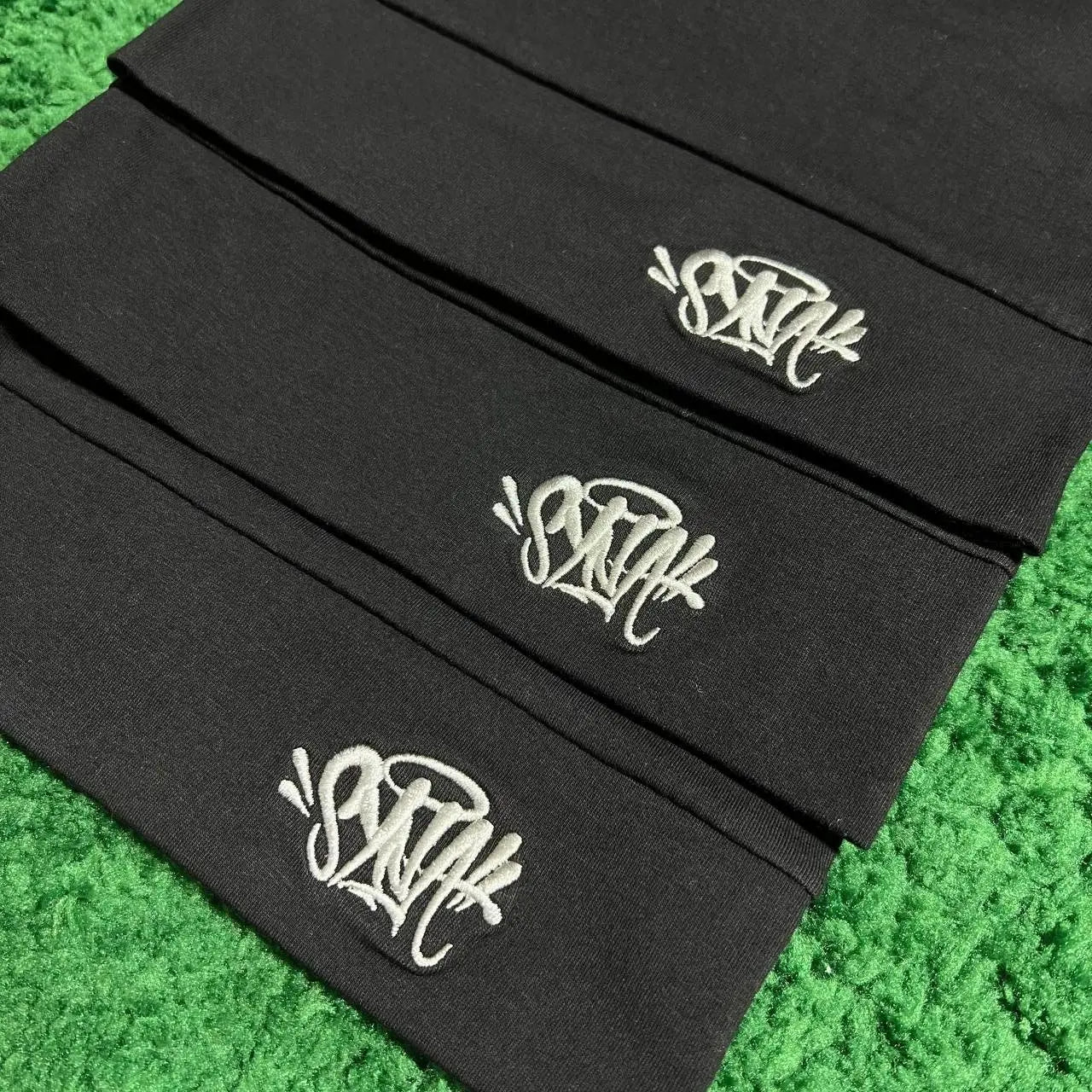 Synaworldbeanies one-size fits all.